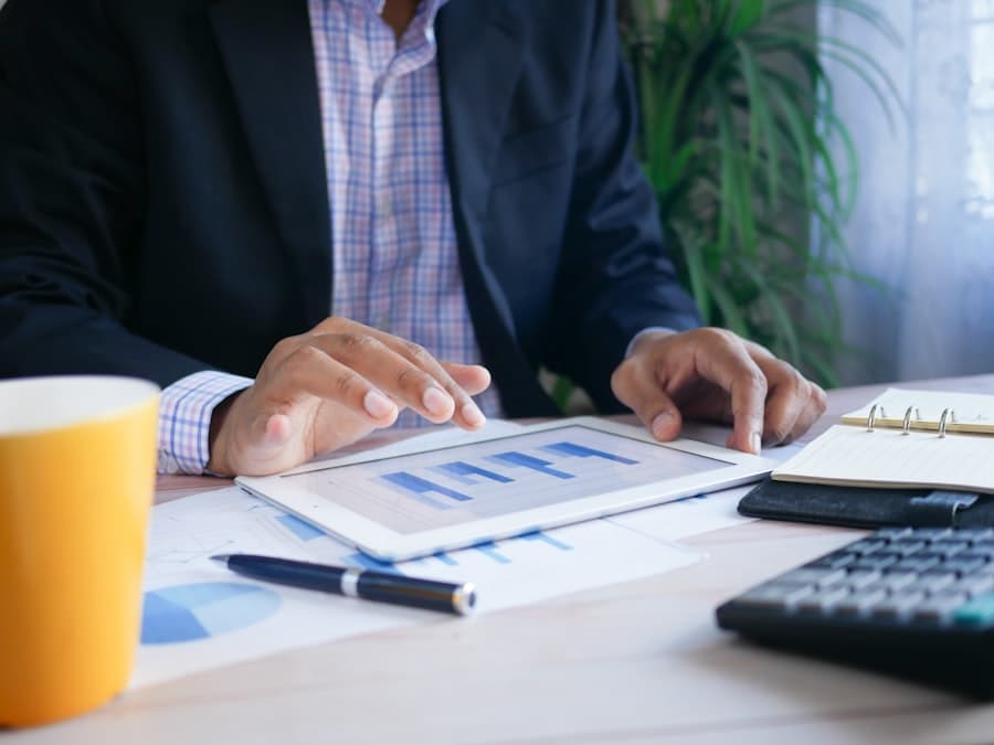 An accountant reviewing financial reports with a client